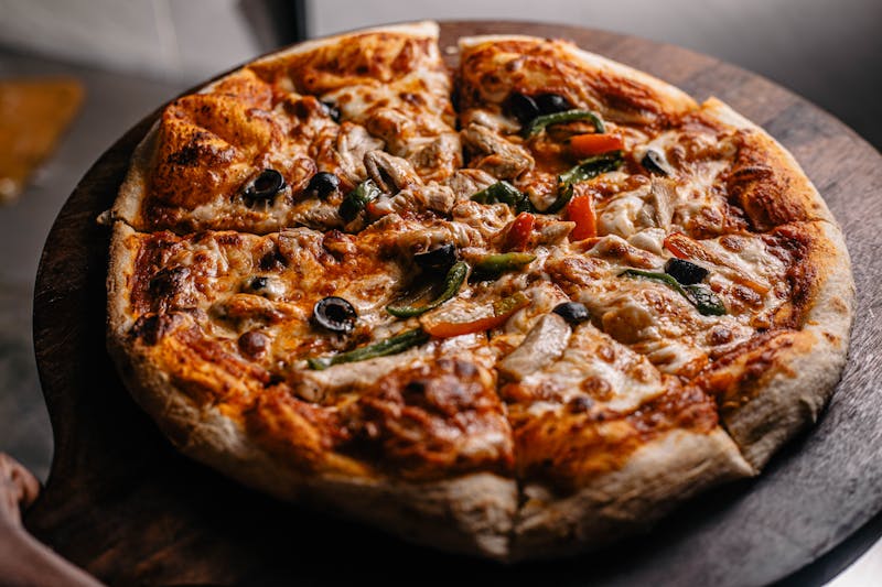 Spicy Ranch Buffalo Pizza with hot sauce and blue cheese