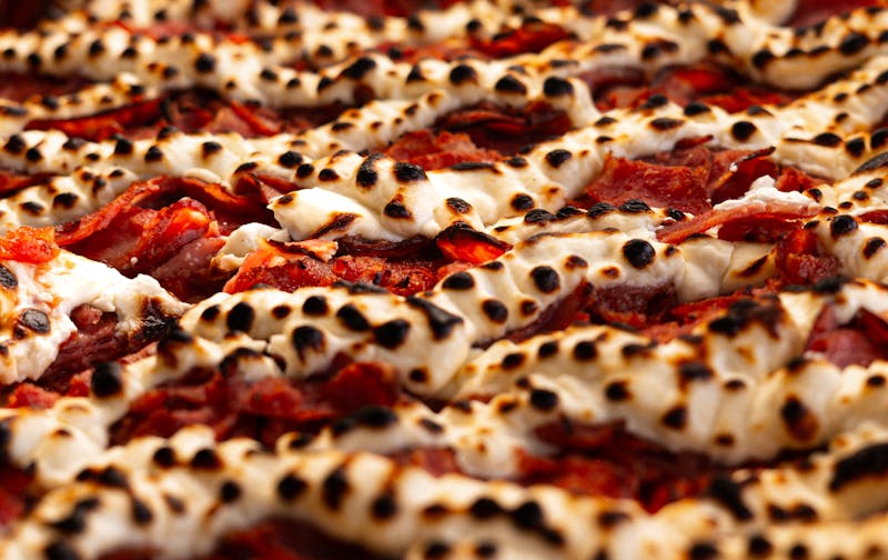 Sweet Cinnamon Dessert Pizza with cream cheese frosting